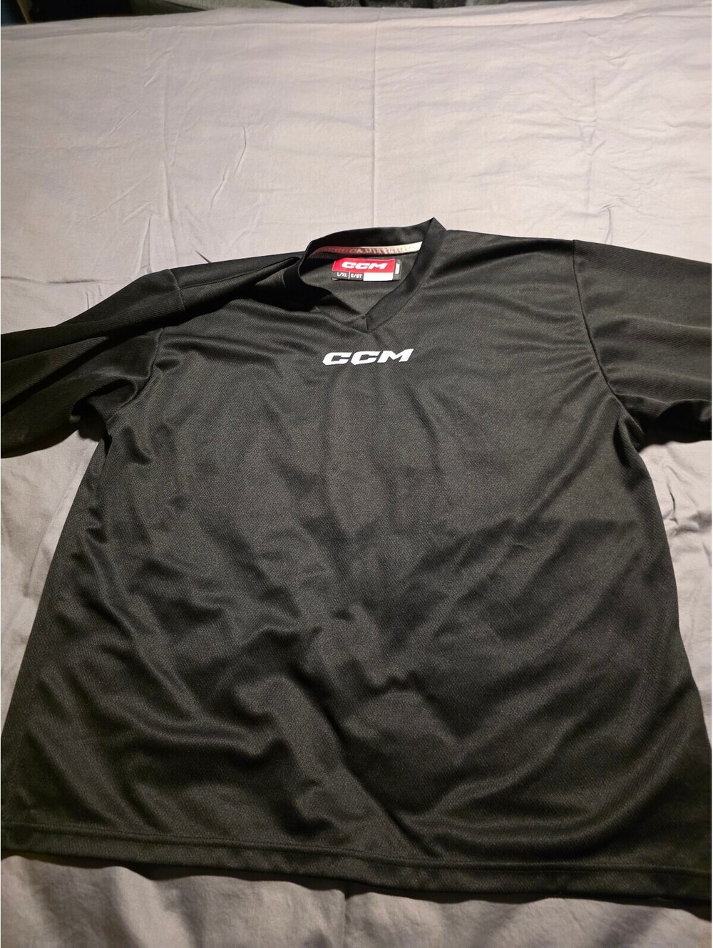 CCM Junior L/XL Black Hockey Practice Jersey Long Sleeve Pullover